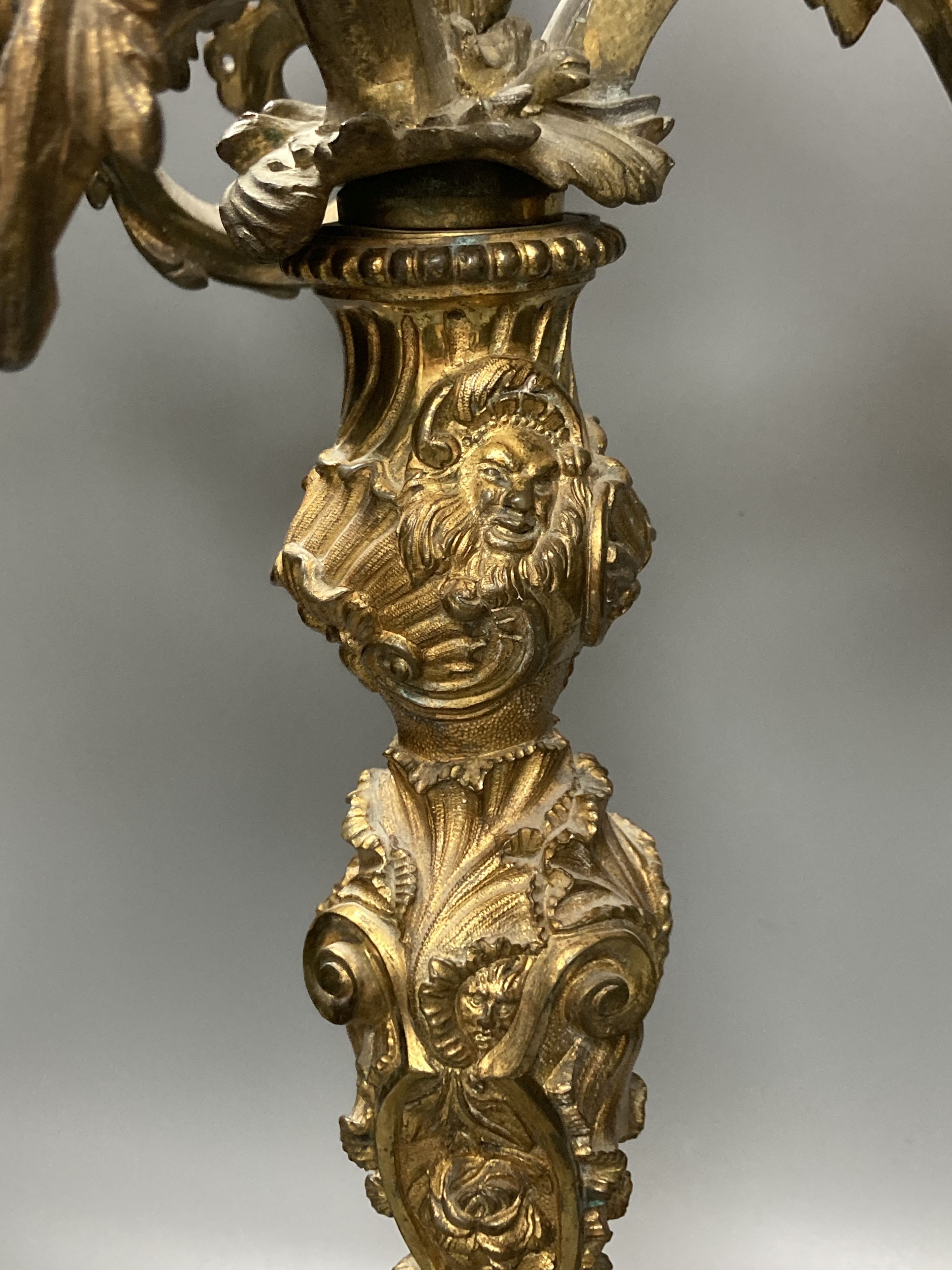 A pair of 19th century Louis XV style ormolu candelabra, 57 cm high